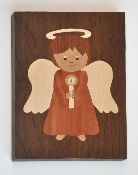 ročno izdelana lesena slika z motivom angela
